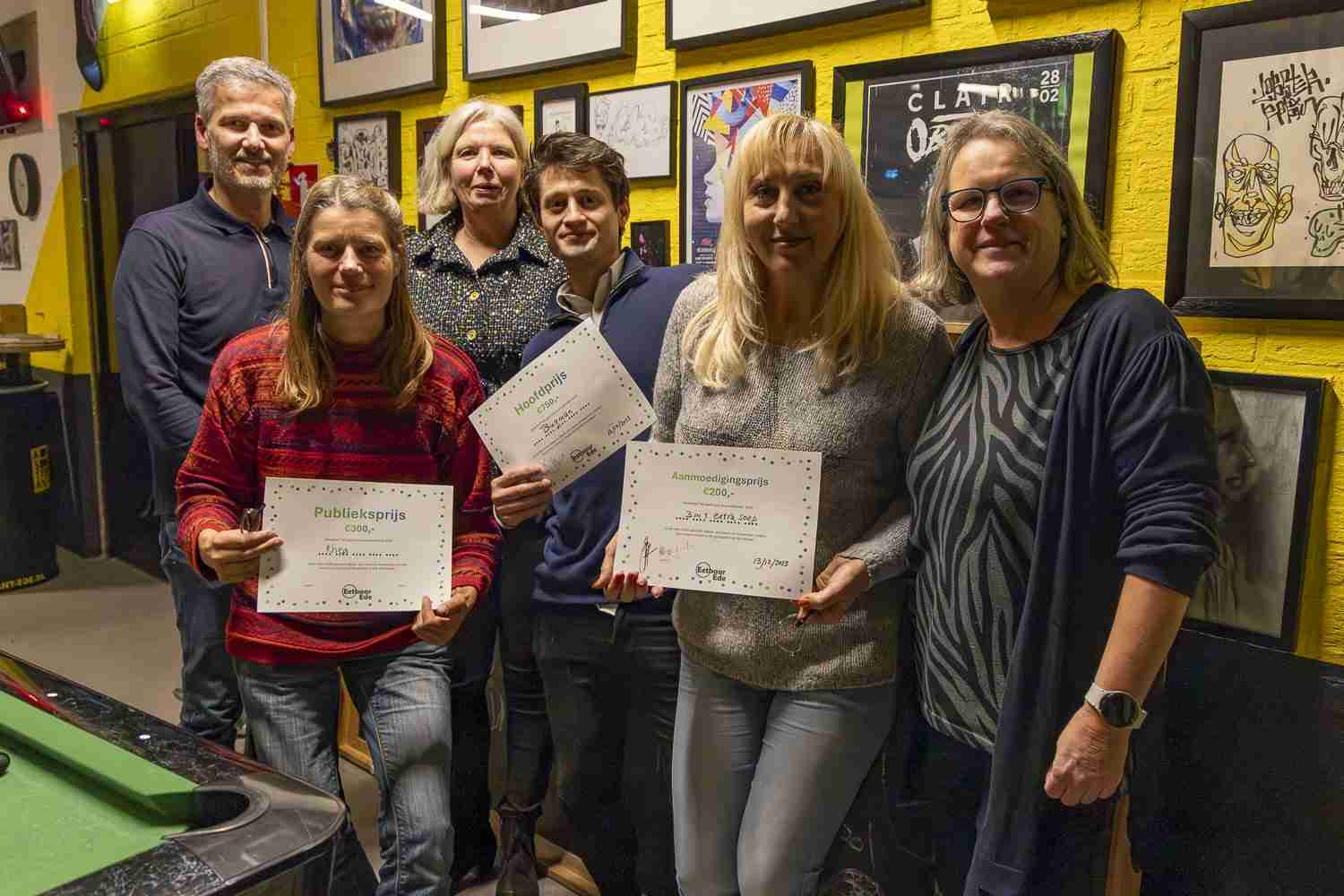 Winnaars samen met de jury